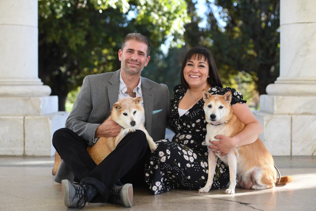 Thomas and wife from Mr. Woof with two Shiba Inus at Cheeseman Park — dog walking and pet sitting in Denver